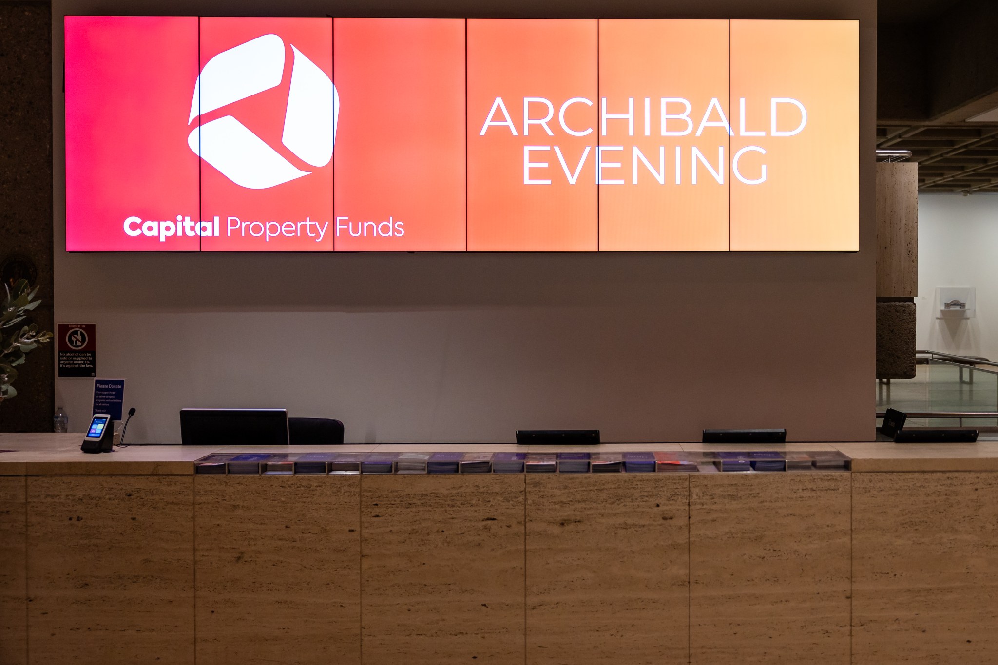 Capital Property Funds Archibald Evening welcome screen above the gallery reception desk