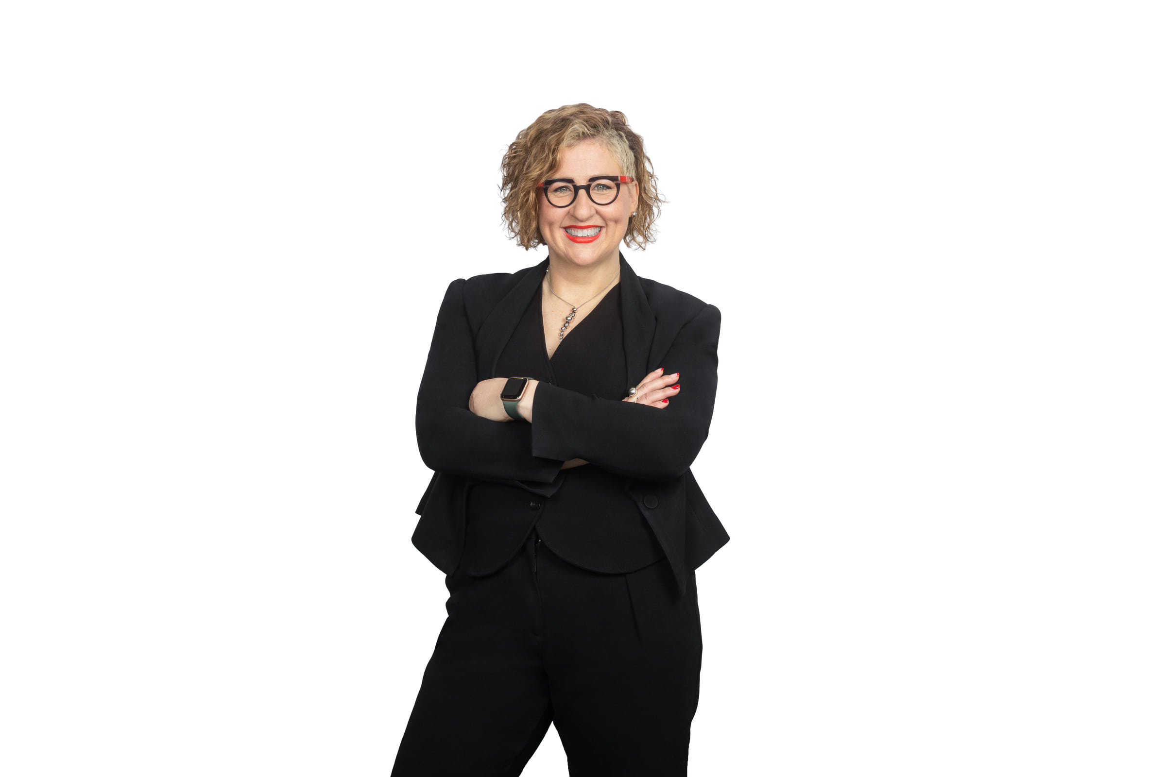 HK Partners team member in a black suit photographed against white